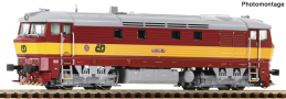 [Lokomotivy] → [Motorov] → [T478.1 „Bardotka”] → 7380007: dieselov lokomotiva erven se lutm vstranm psem, ed stecha a pojezd